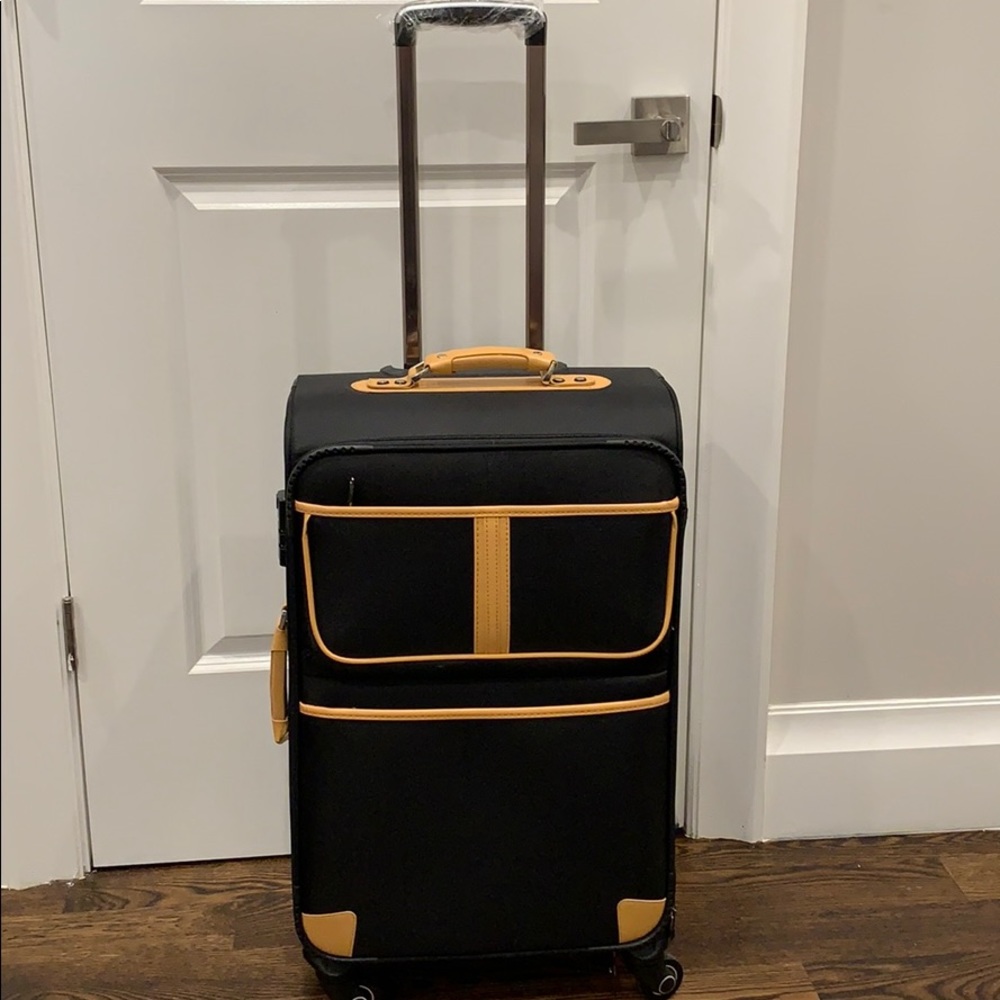 black luggage with beige details